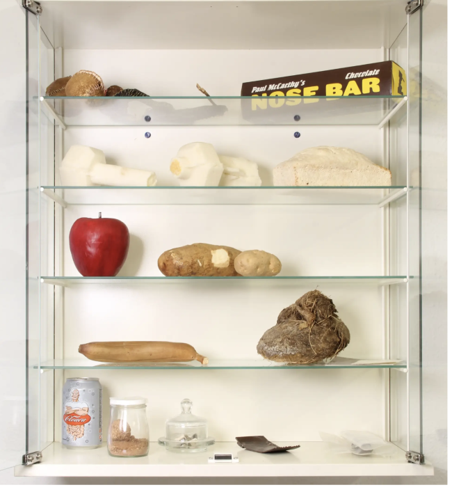 Christian Scheidemann's cabinet in his former studio displaying technical studies of fruit peels and banana for Zoe Leonard's Strange Fruit, 1992–97, pound cake tests for Matthew Barney's OTTOshaft, 1992, and an ‘extra' elephant dung from Chris Ofili. © Christian Scheidemann