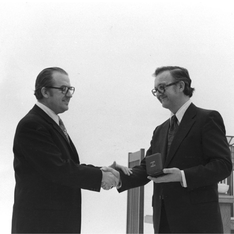 Edward Maser (right), director of the David and Alfred Smart Museum at the University of Chicago, is awarded Austria's Cross of Honor in Science and Art by Austrian Consul General Eduard Adler (left). University of Chicago Photographic Archive, [apf1-04121], Special Collections Research Center, University of Chicago Library